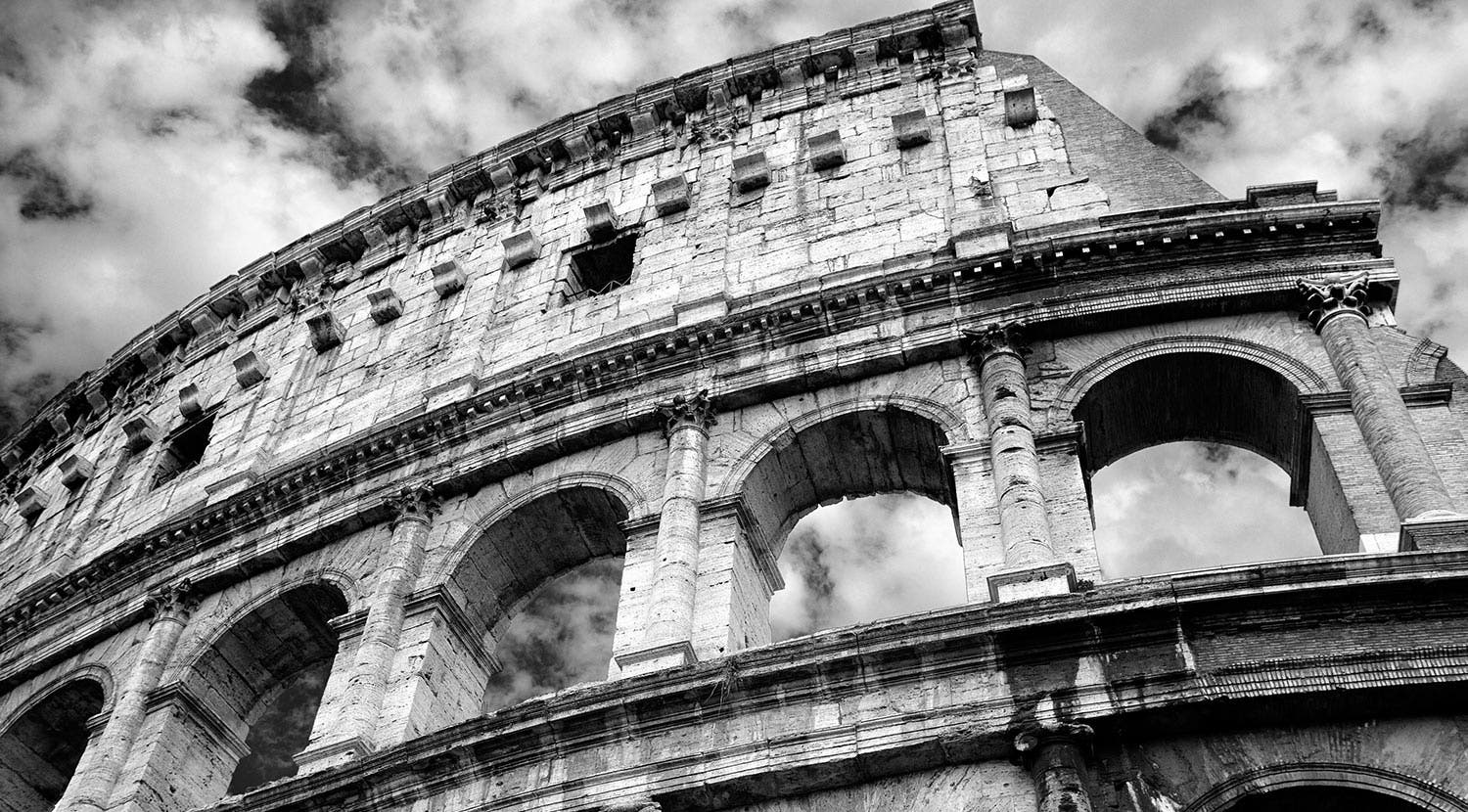 Monochrome black and white photo of Colosseum in Rome