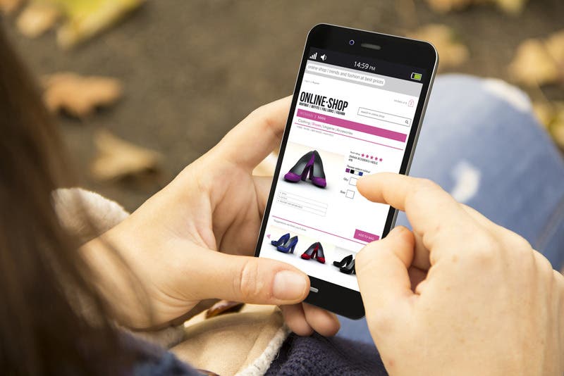 woman looking for promo code to use for cyber monday shopping