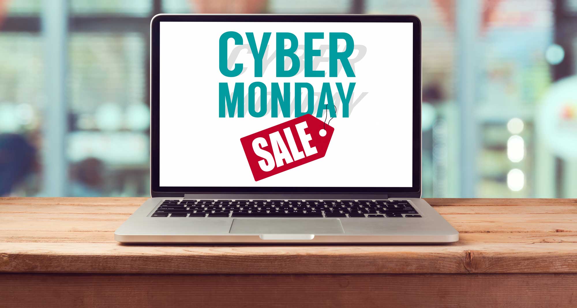 cyber monday deals sign on laptop monitor