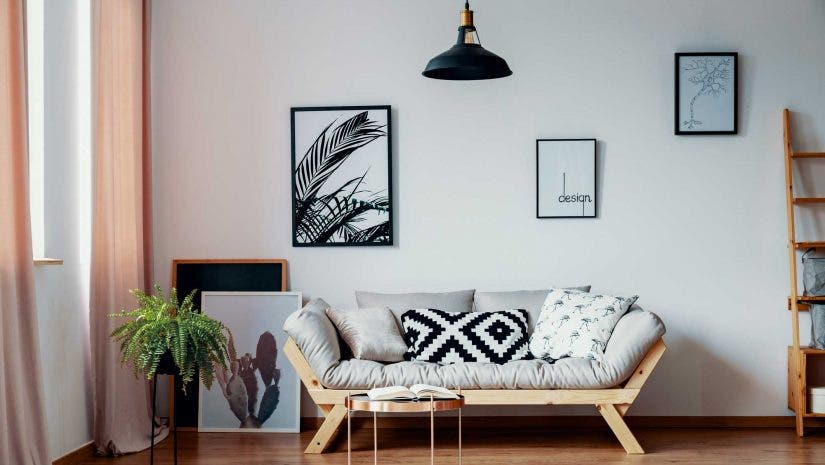 Patterned pillow on scandinavian sofa real estate photo shoot