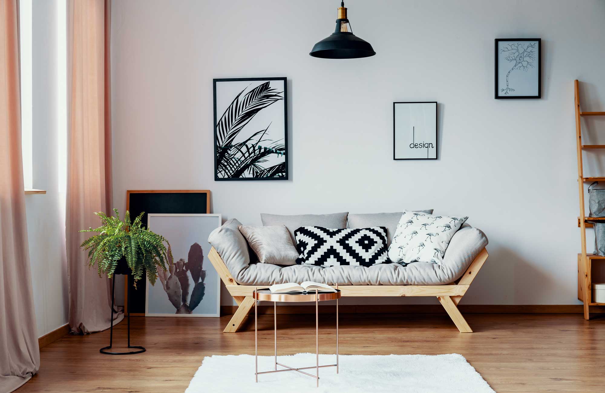 Patterned pillow on scandinavian sofa real estate photo shoot