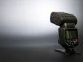 flash unit on black background in studio