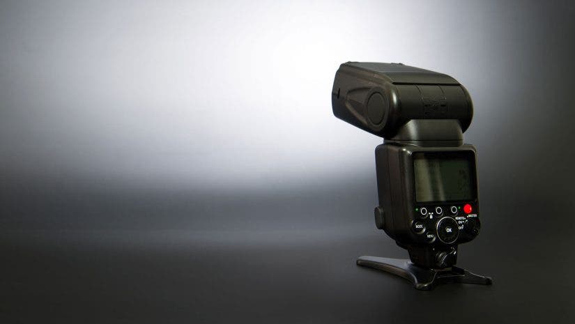 flash unit on black background in studio