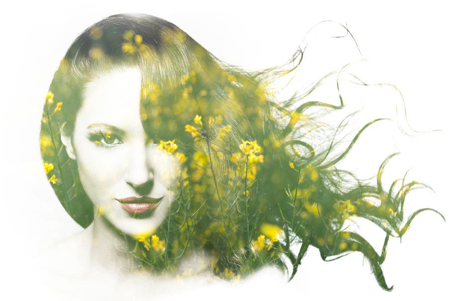 Double exposure of woman and field of yellow flowers