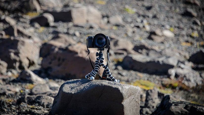 tabletop tripods mini tripods joby gorillapod with camera on beach rocks