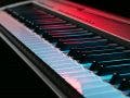 digital piano under blue and red mood lights