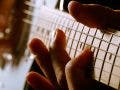 guitar playing stratocaster fingers on fretboard