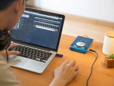 Music recording with Macbook laptop on work desk