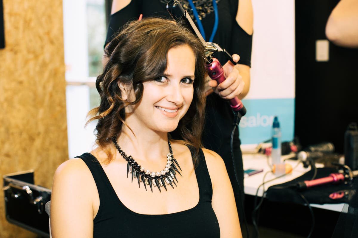 A 2017 Photo Shoot for a Cure guest receives a makeover session from Sephora Prudential Center.