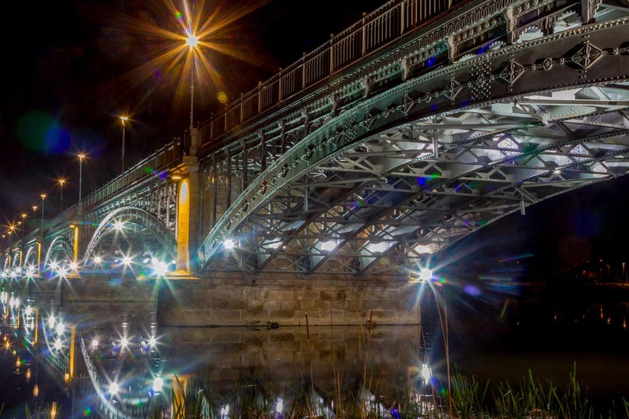 8-point star special effects camera lens filter used to capture night photo of bridge
