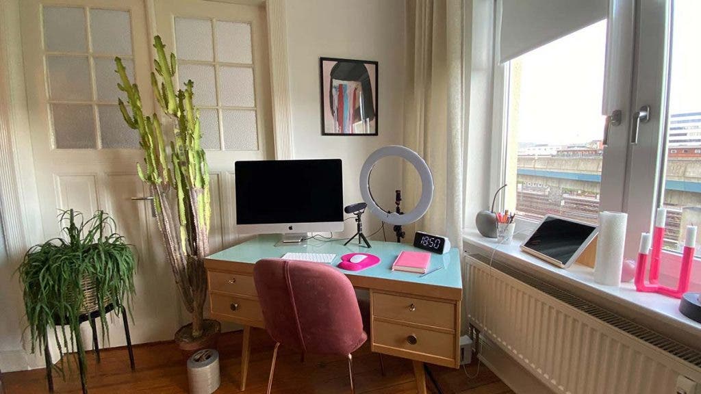 youtube equipment setup on desk with computer, microphone, ring light