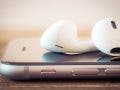 apple podcasts with headphones and iphone