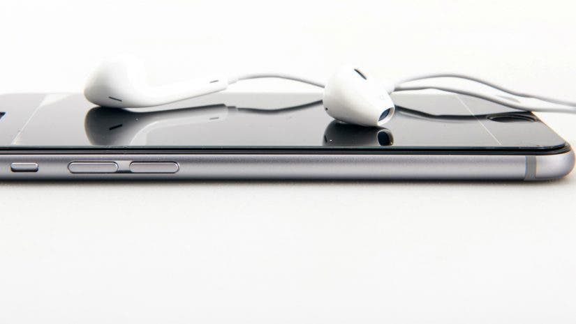 How To Get Your Podcast On Itunes Adorama Learning Center - apple iphone and earphones for podcast concept
