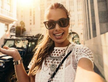 female vlogger recording herself