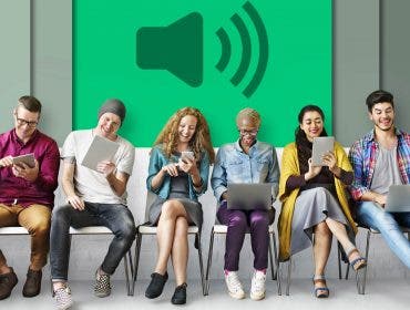 conceptual image of group of people with screen gadgets and audio icon in background