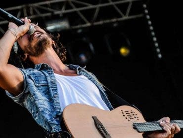 a singer belting into a wireless microphone