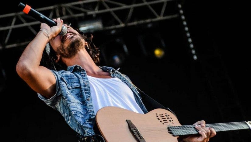 a singer belting into a wireless microphone