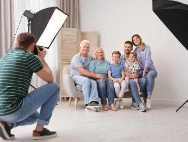 a photographer taking a family portrait