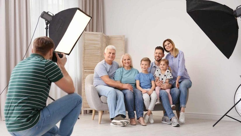 a photographer taking a family portrait