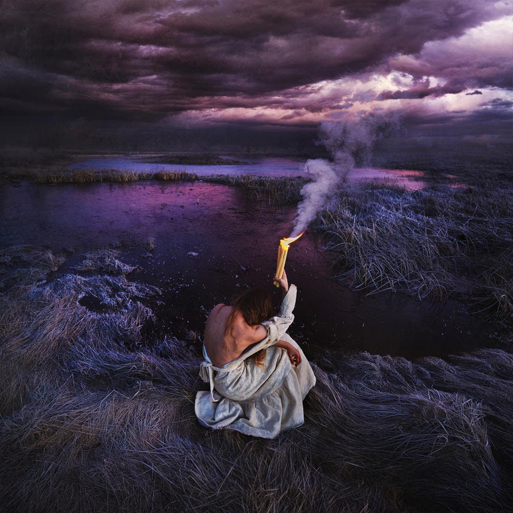 Brooke Shaden offering self portrait