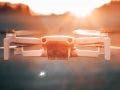 drone flying at sunset drones for beginners dji mavic mini drone