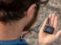 Zoom F2 Field Recorder in hand outdoor adventure audio recordings