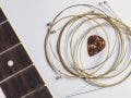 acoustic guitar strings and pick
