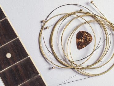 acoustic guitar strings and pick