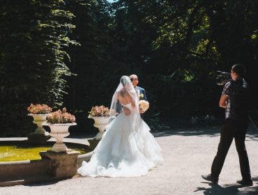 best zoom lenses for wedding video videographer with camera bride groom