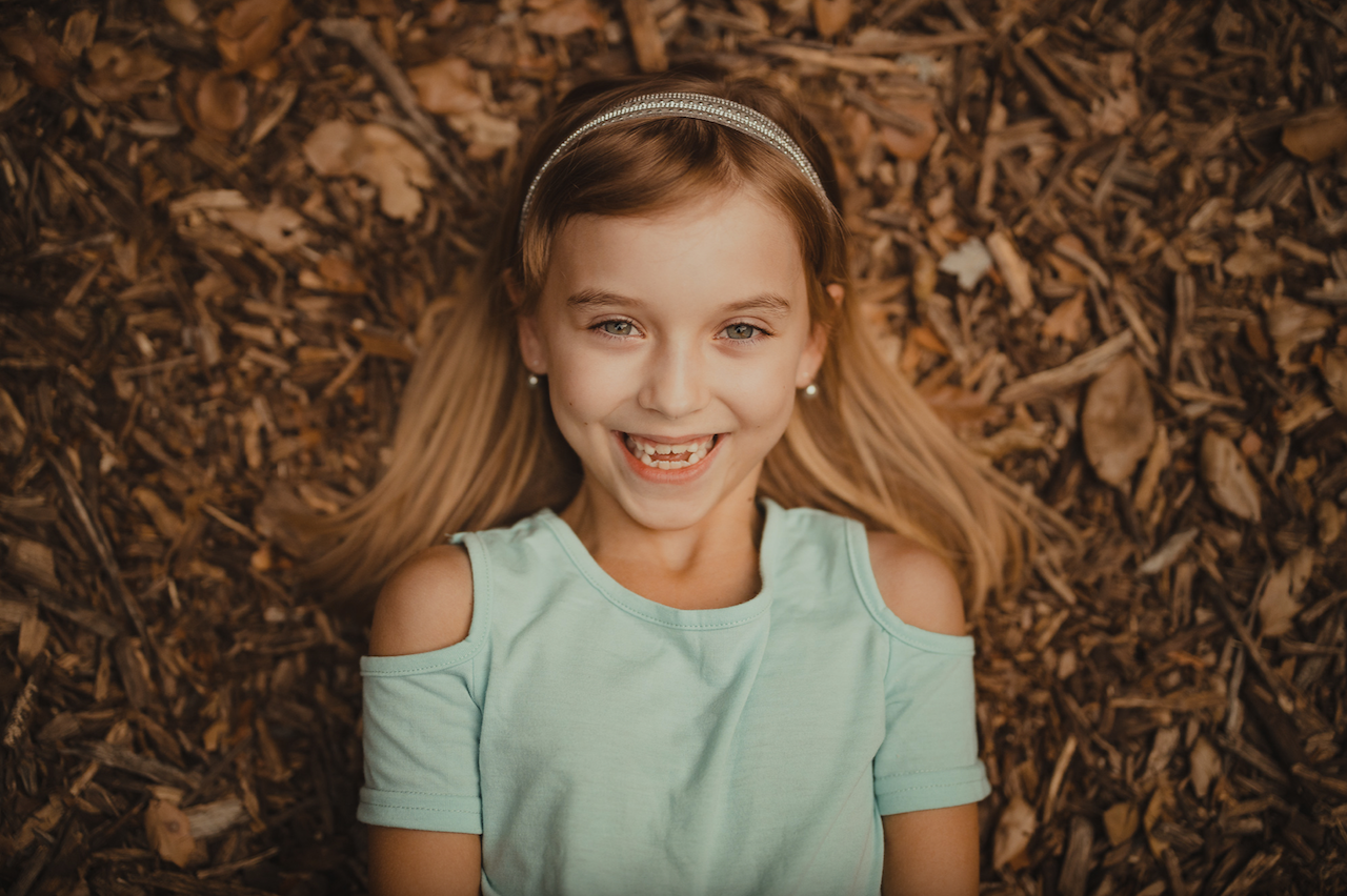 overhead top down photo of young girl