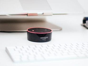Amazon Echo Dot on a white desk