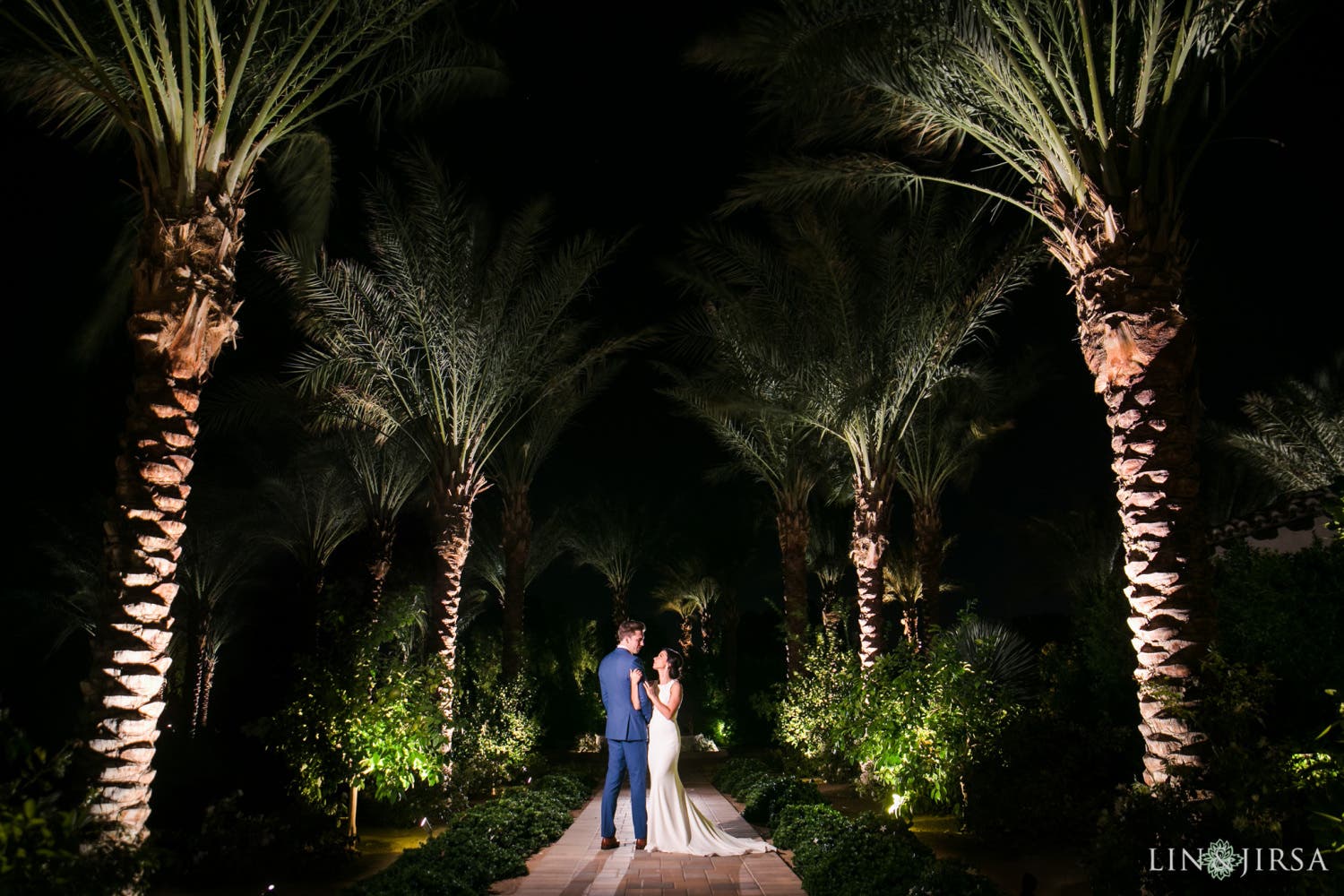 Couple stands in a reversed pose