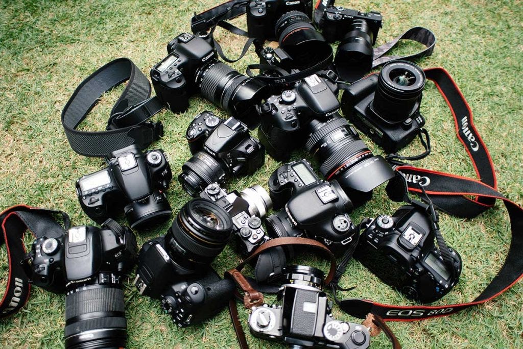 different types of cameras for photography on the grass