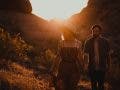 lens flare tips couple walking at sunset