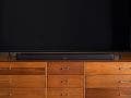 Bose Soundbar 900 on living room entertainment center