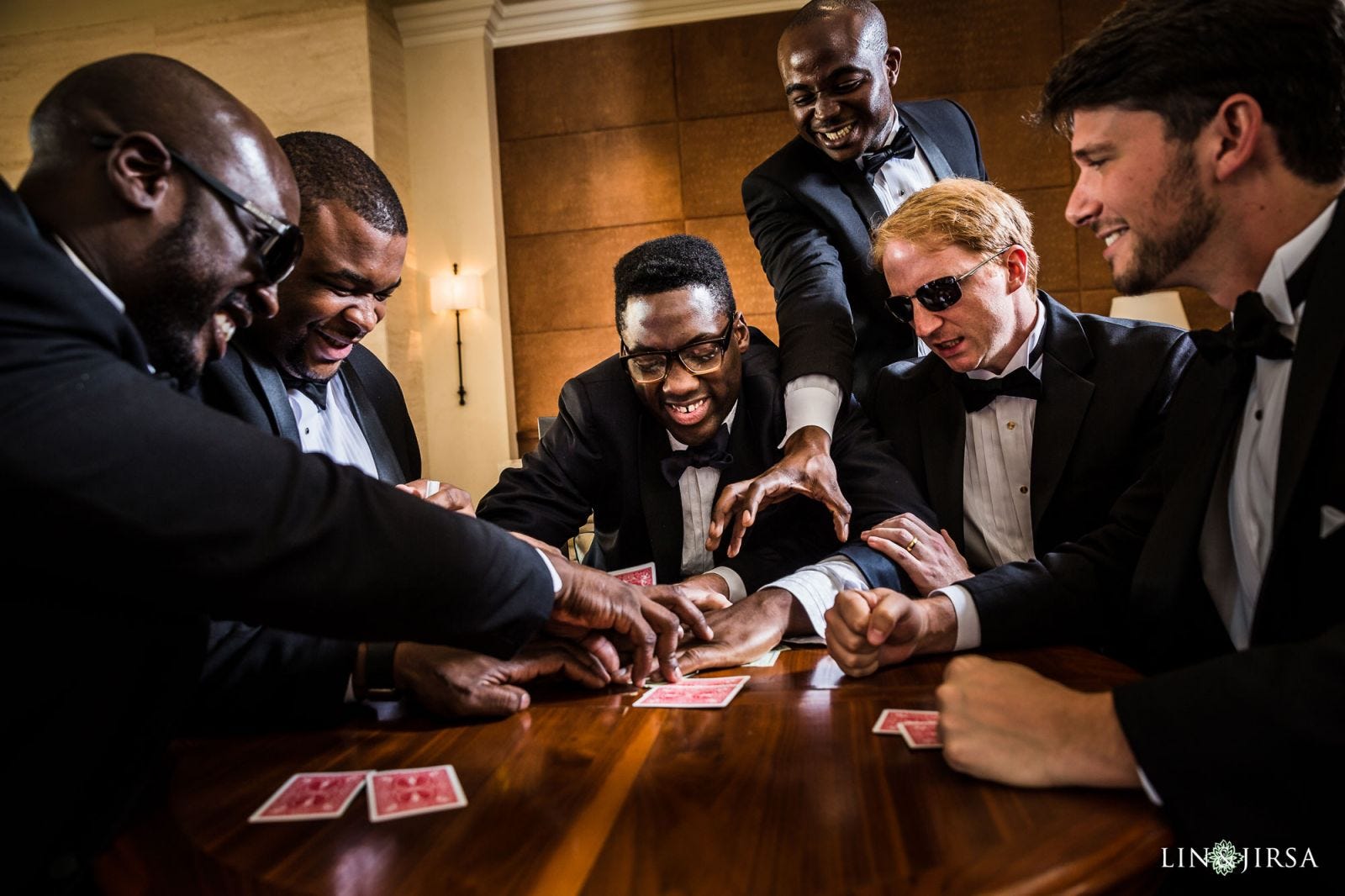 group photo poses for groomsmen poker game