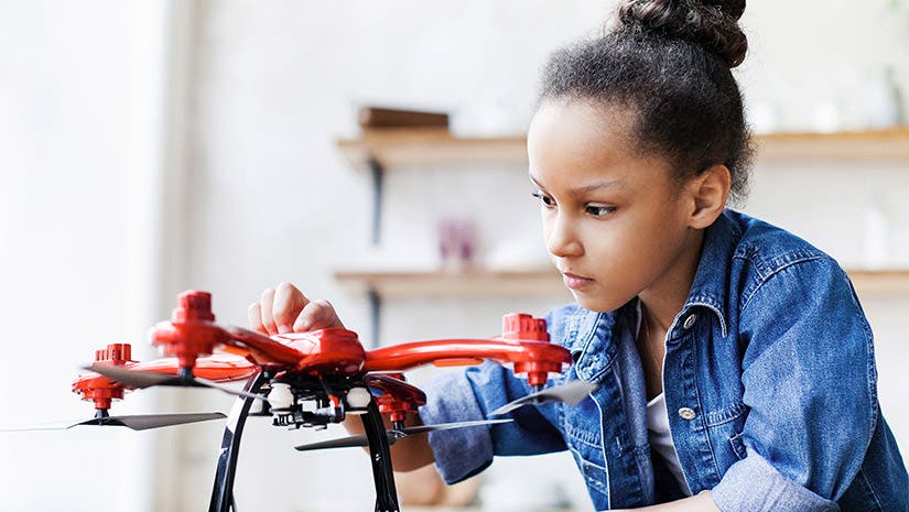 drones in education student flying drone