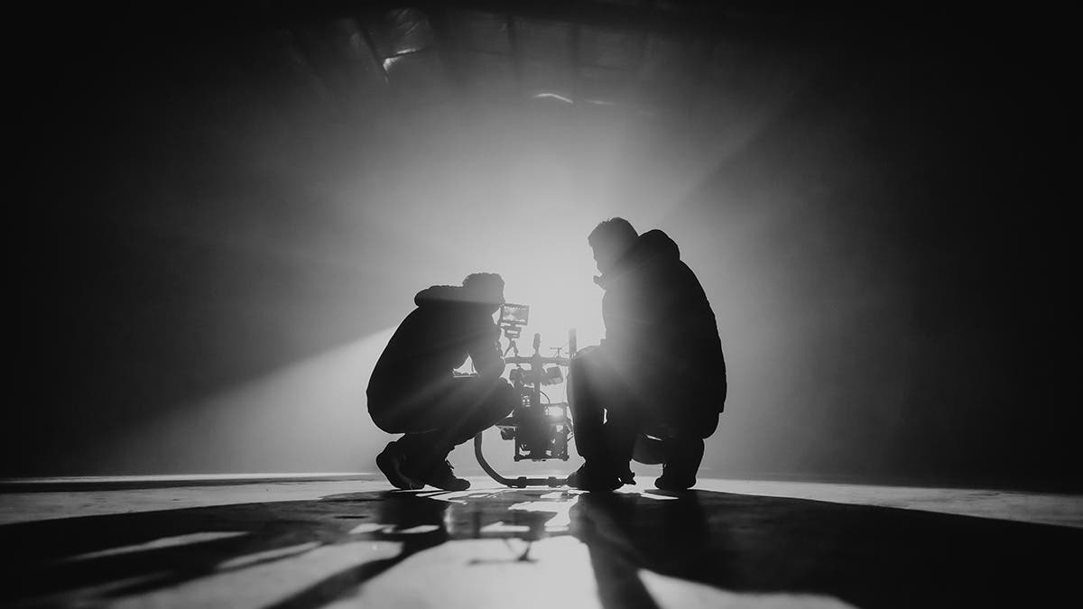 film director vs producer on set