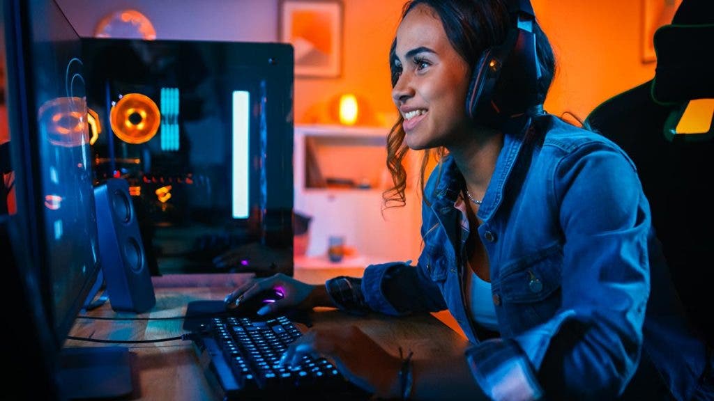 female student in esports club playing video games