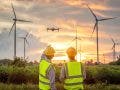construction drone pilots with windmills