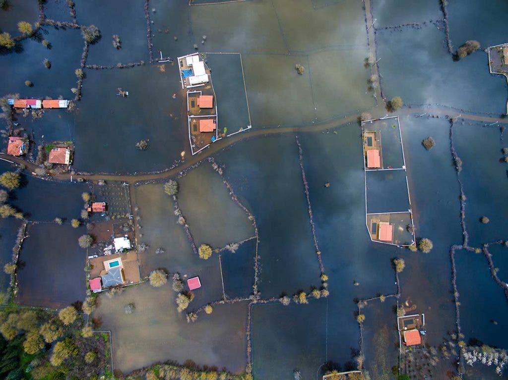 town flooding aerial view from drones in a natural disaster response