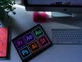 adobe programs logos on tablet and imac