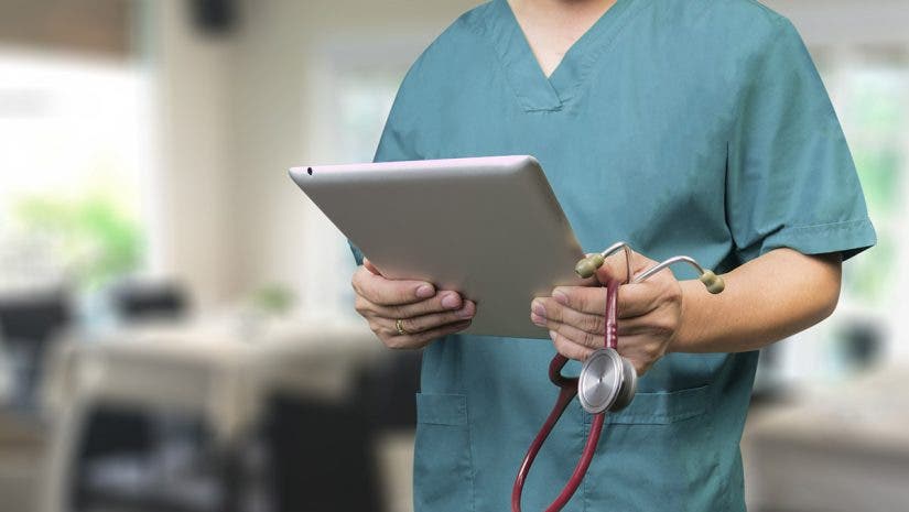 doctor practicing telemedicine with ipad