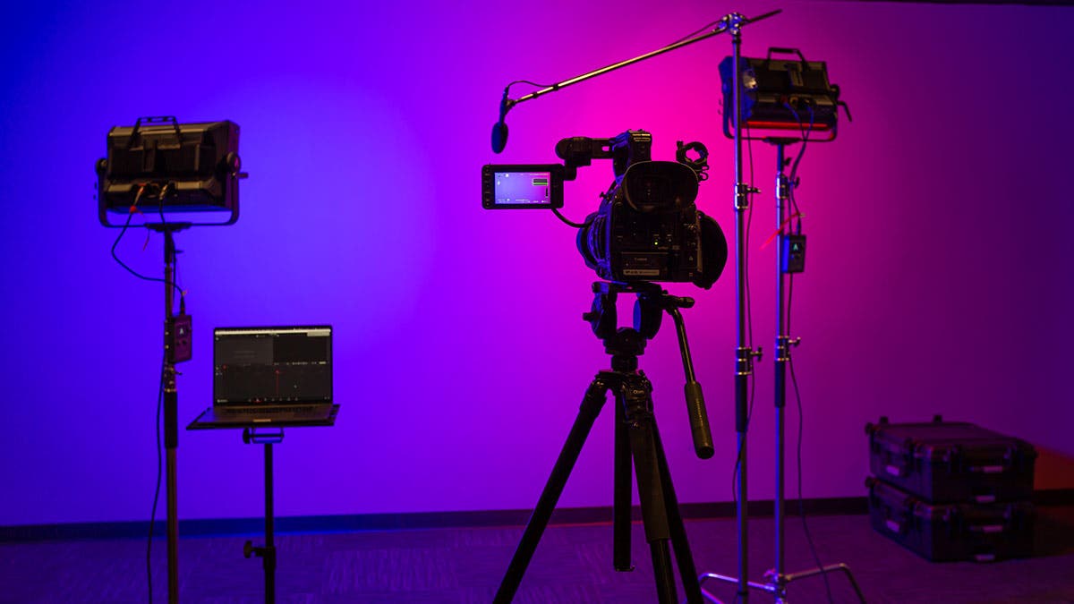 West Coast Baptist College video production studio setup with camera and lighting