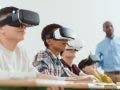 teacher and students in classroom education setting using virtual reality headsets