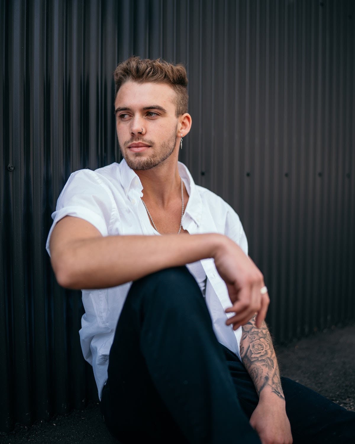 Stylish boy sitting on the chair in the Café - PixaHive