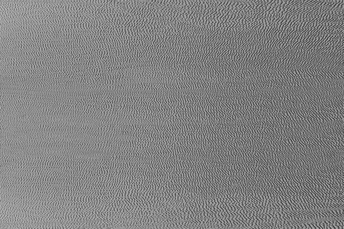 Grain textured gray fabric backdrop, moire in photography