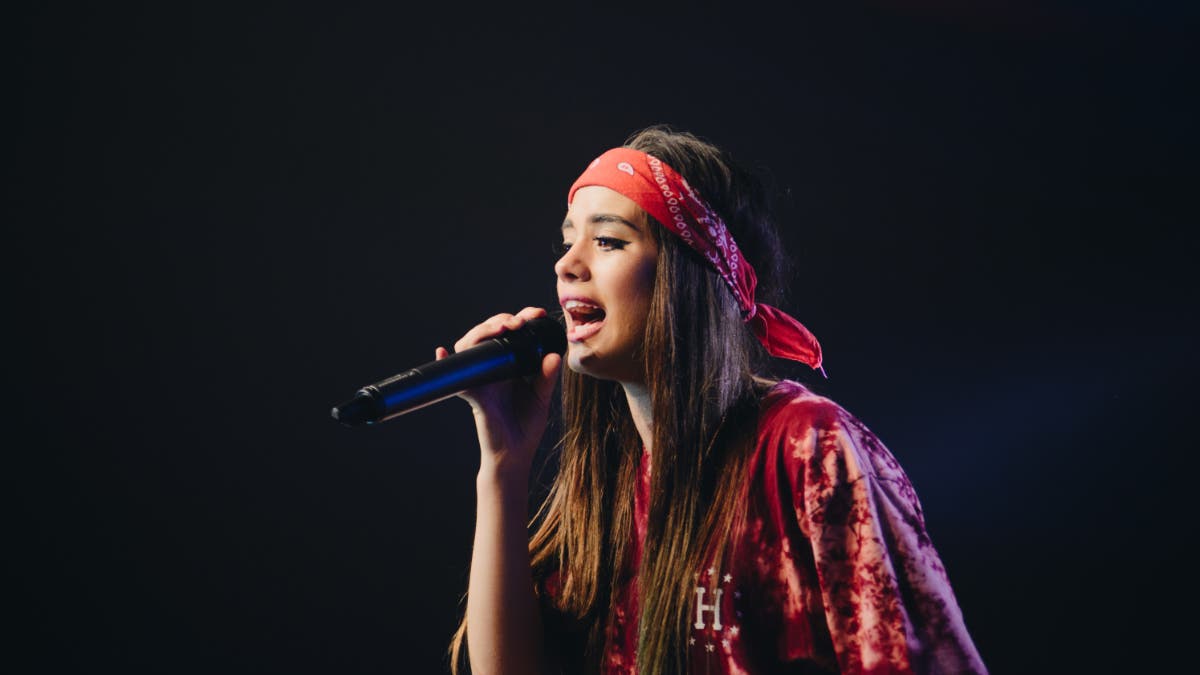Female Singer with red bandana headband