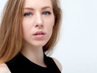 Portrait of a blonde woman (Marisa Roper) created with a scrim