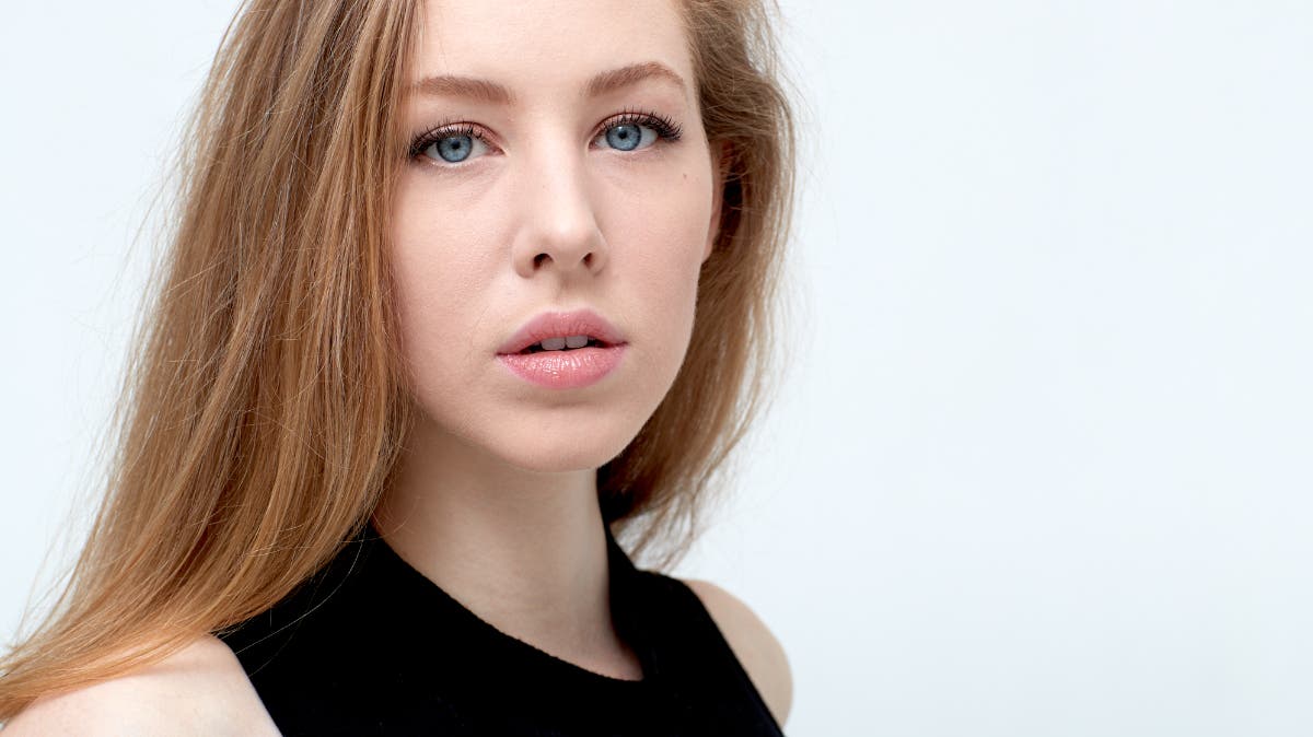 Portrait of a blonde woman (Marisa Roper) created with a scrim